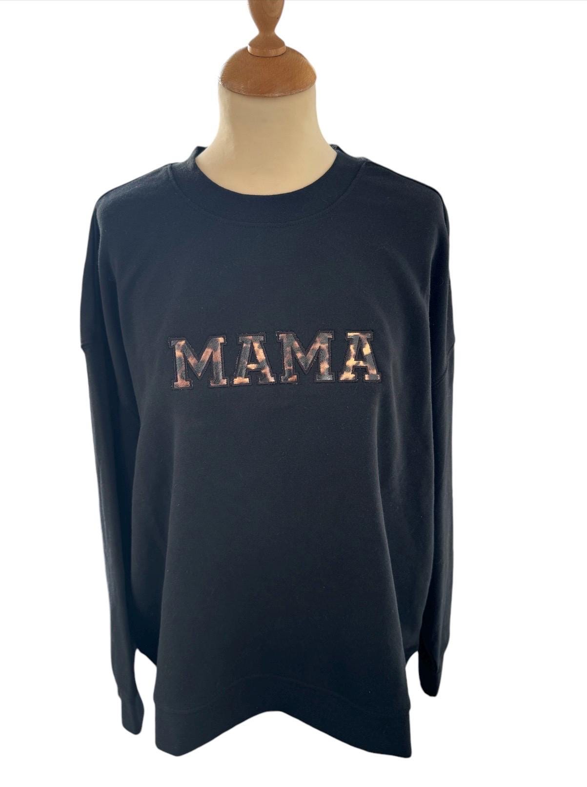 Black oversized sweater with MAMA in leopard print